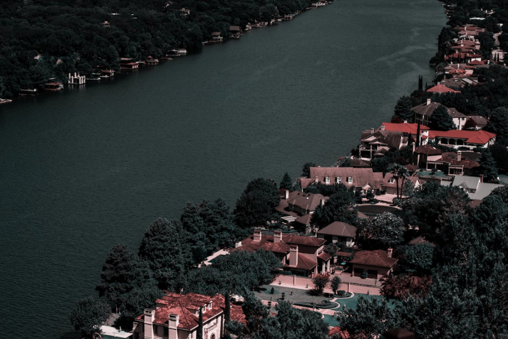 Aerial view of upscale River Oaks neighborhood showing luxury homes and tree-lined streets in Houston, Texas