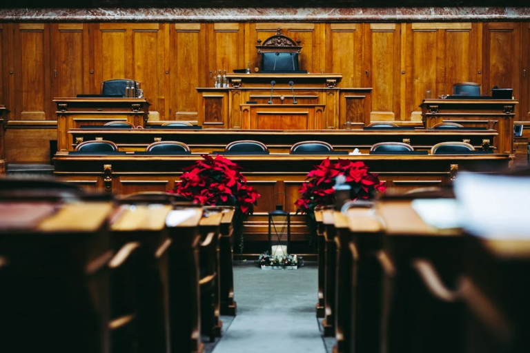 an empty courthouse with a wooden interior