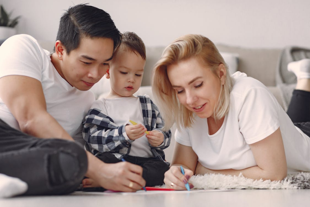 Parents doing arts and crafts with their child