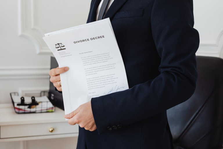 A person holding divorce papers