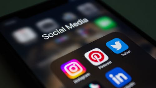 Smartphone screen displaying multiple social media applications