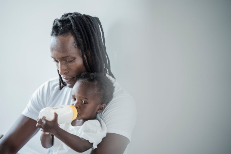 a father taking care of his child