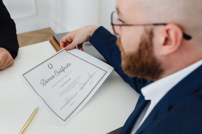 a person holding a divorce certificate