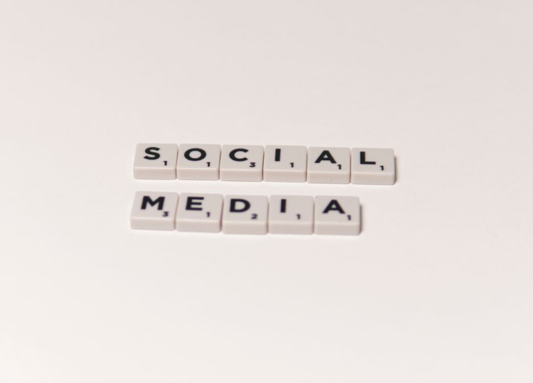 scrabble tiles spelling “social media”