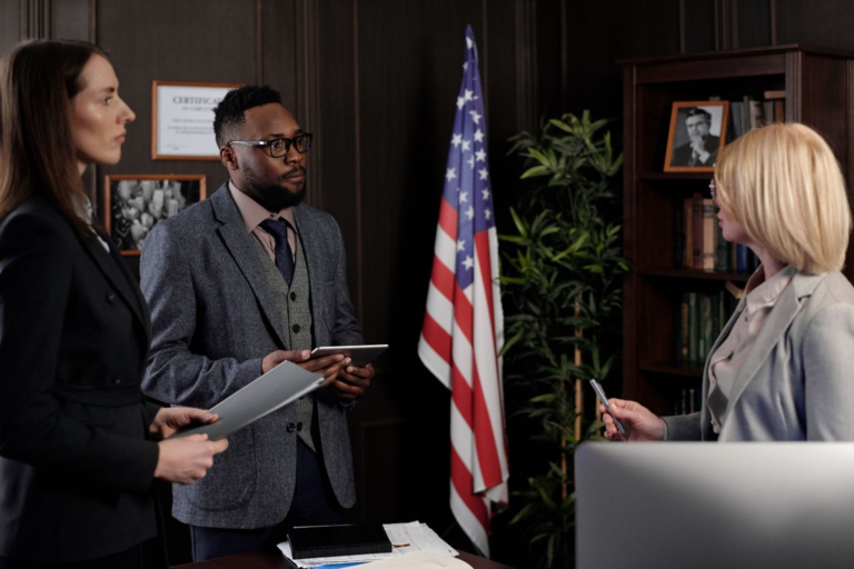 Attorneys discussing case details representing negotiation in a contested divorce