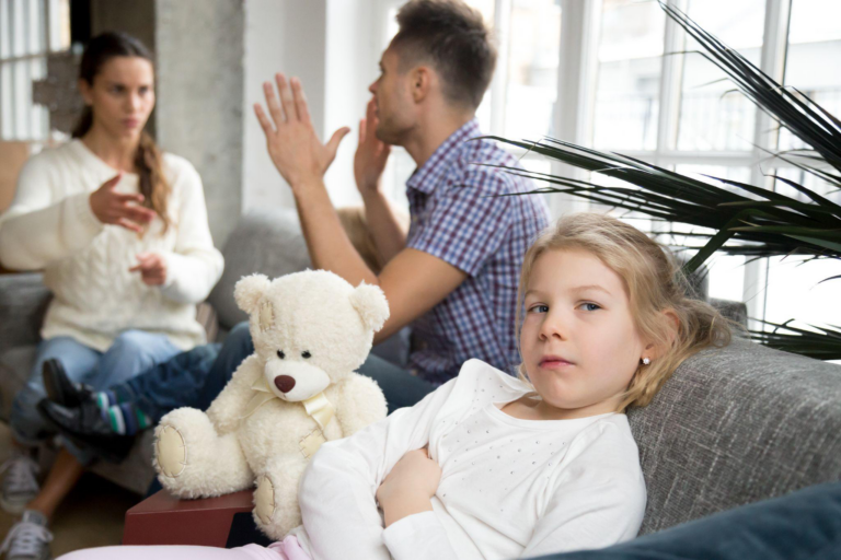 A couple having an argument in front of their child