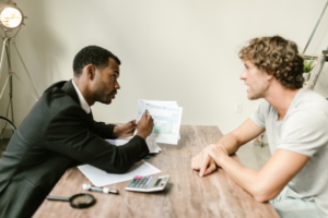 two people reviewing paperwork