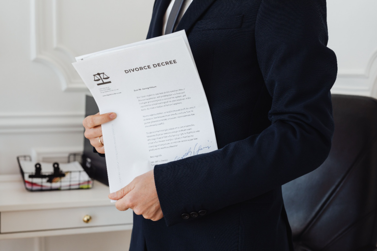 A lawyer holding divorce decree