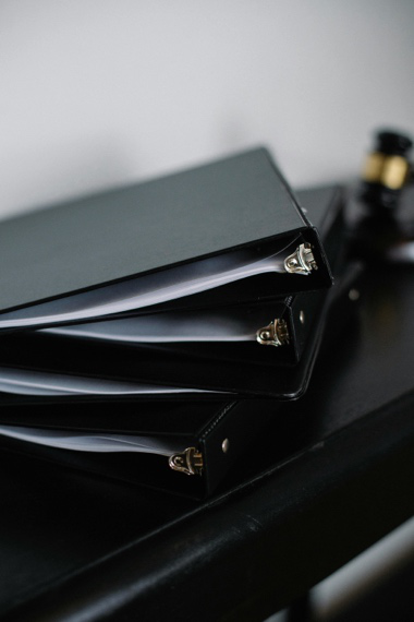 Stack of family court documents related to emergency custody orders in Texas