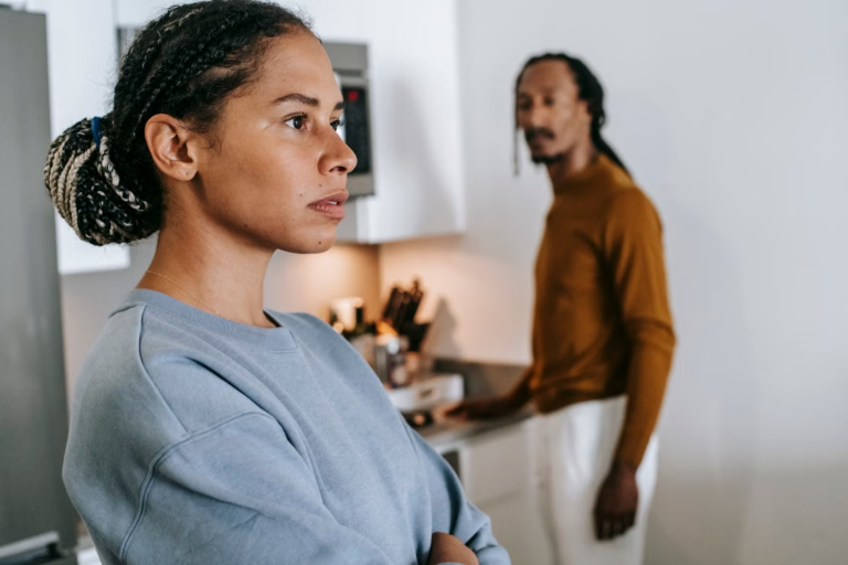 Couple arguing at home during a high-conflict custody situation