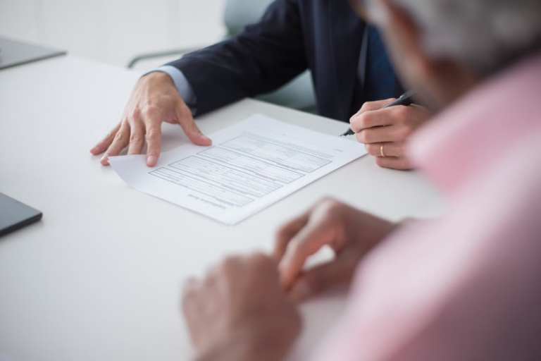 Attorney reviewing a legal document with a client.