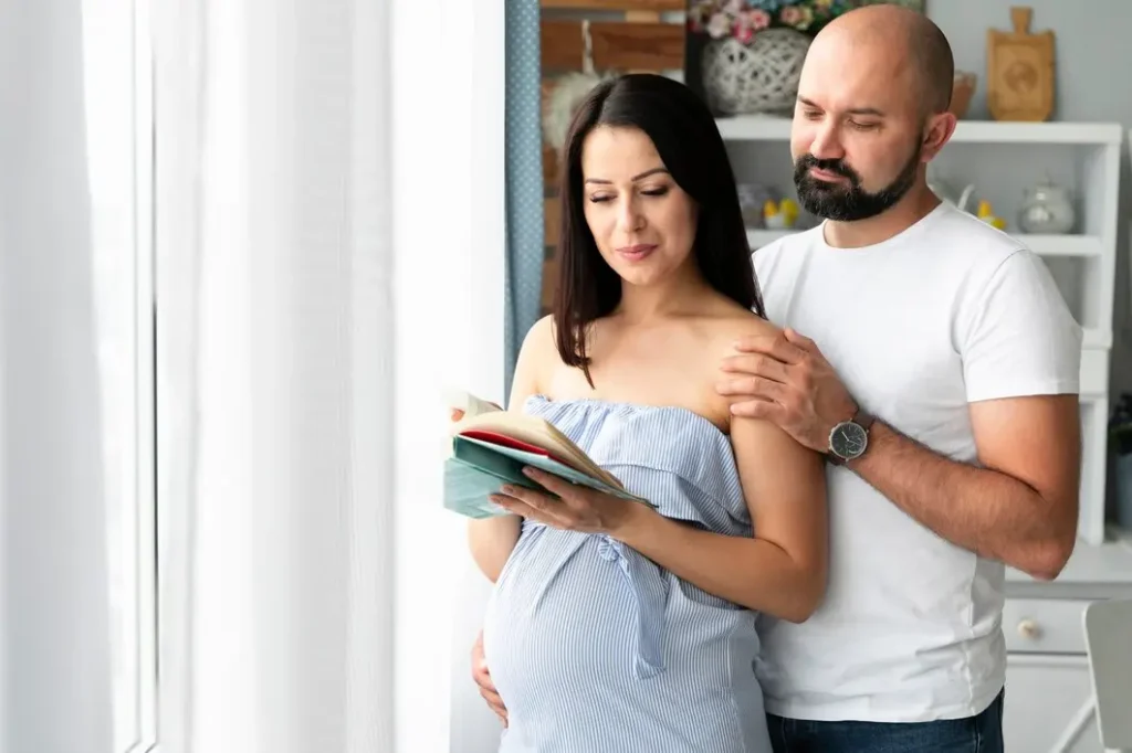 husband pregnant wife searching baby names