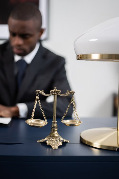 Brass balance scale on a lawyer's desk representing just and right property division in Texas