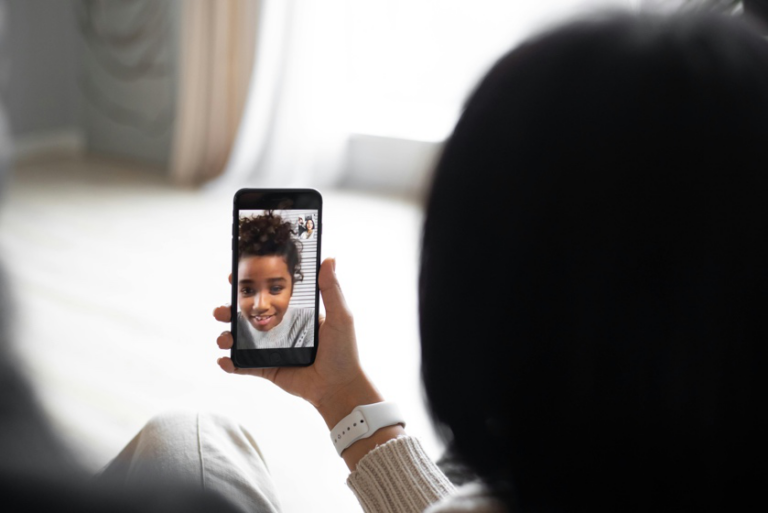 Parent video calling a child after moving to another city under a custody agreement