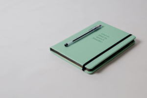 a notebook and pen