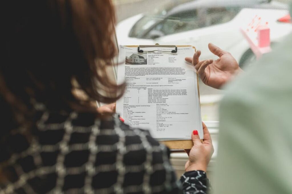two people going through property papers