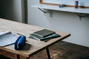 a desk with school supplies
